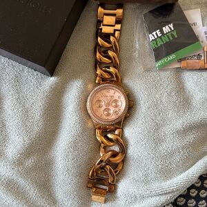 Michael Kors rose gold watch with stones
